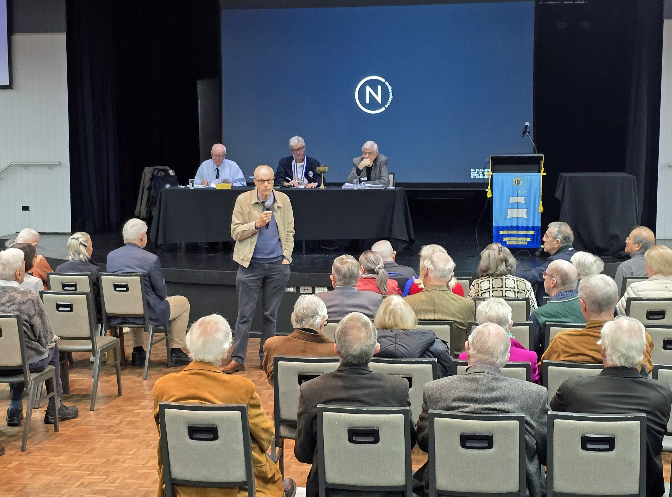 addressing the meeting